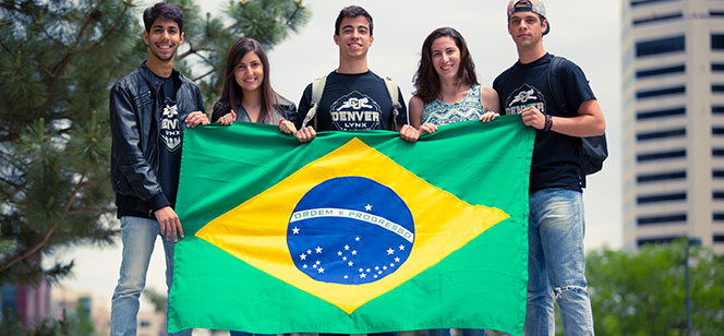 students holding the Brazilian flag