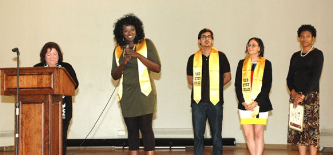 students speaking on stage
