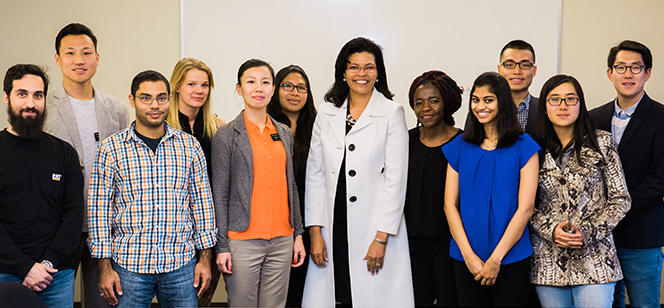 Dr. Kim Hunter Reed with international students