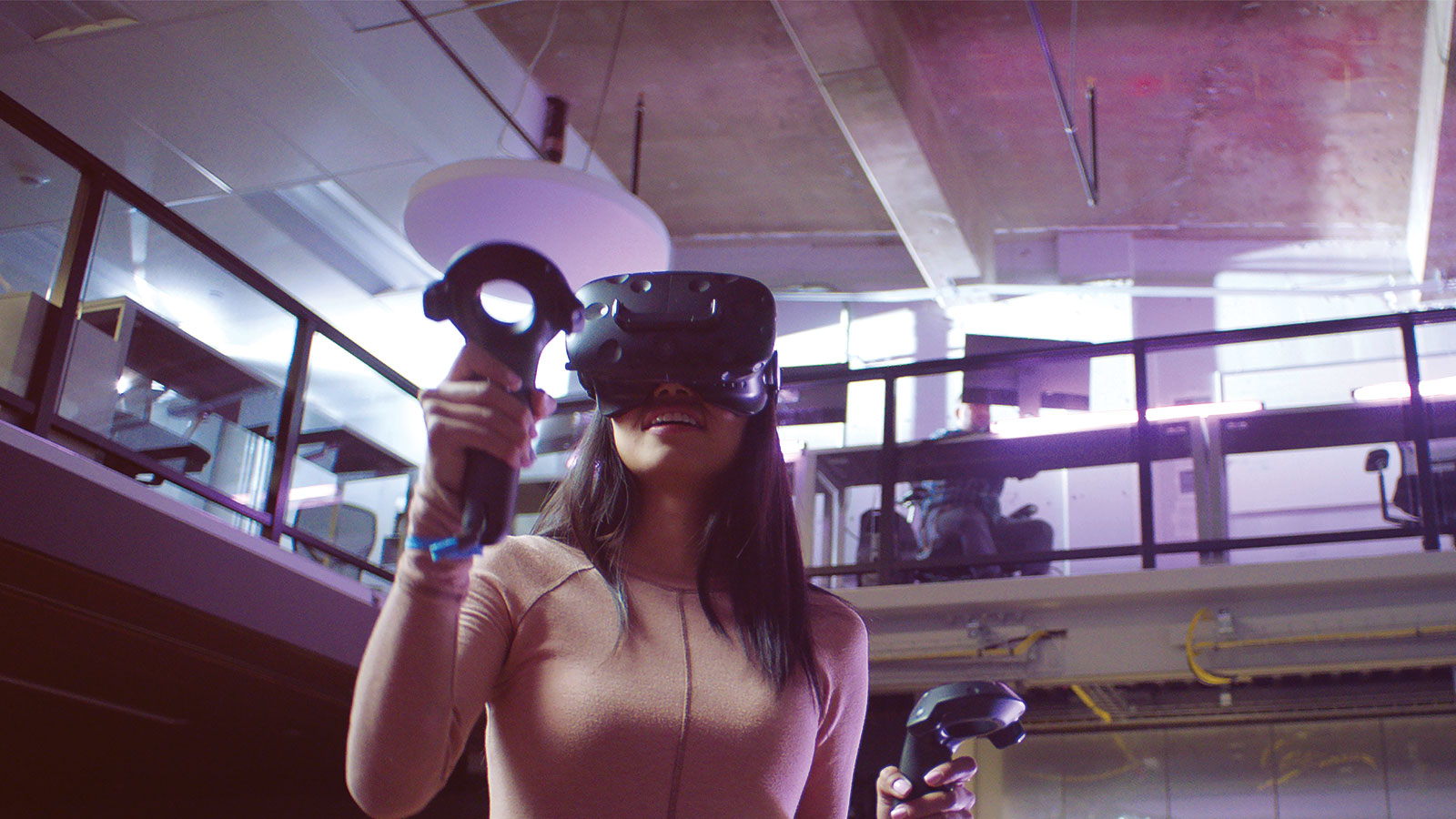 Female student using VR goggles