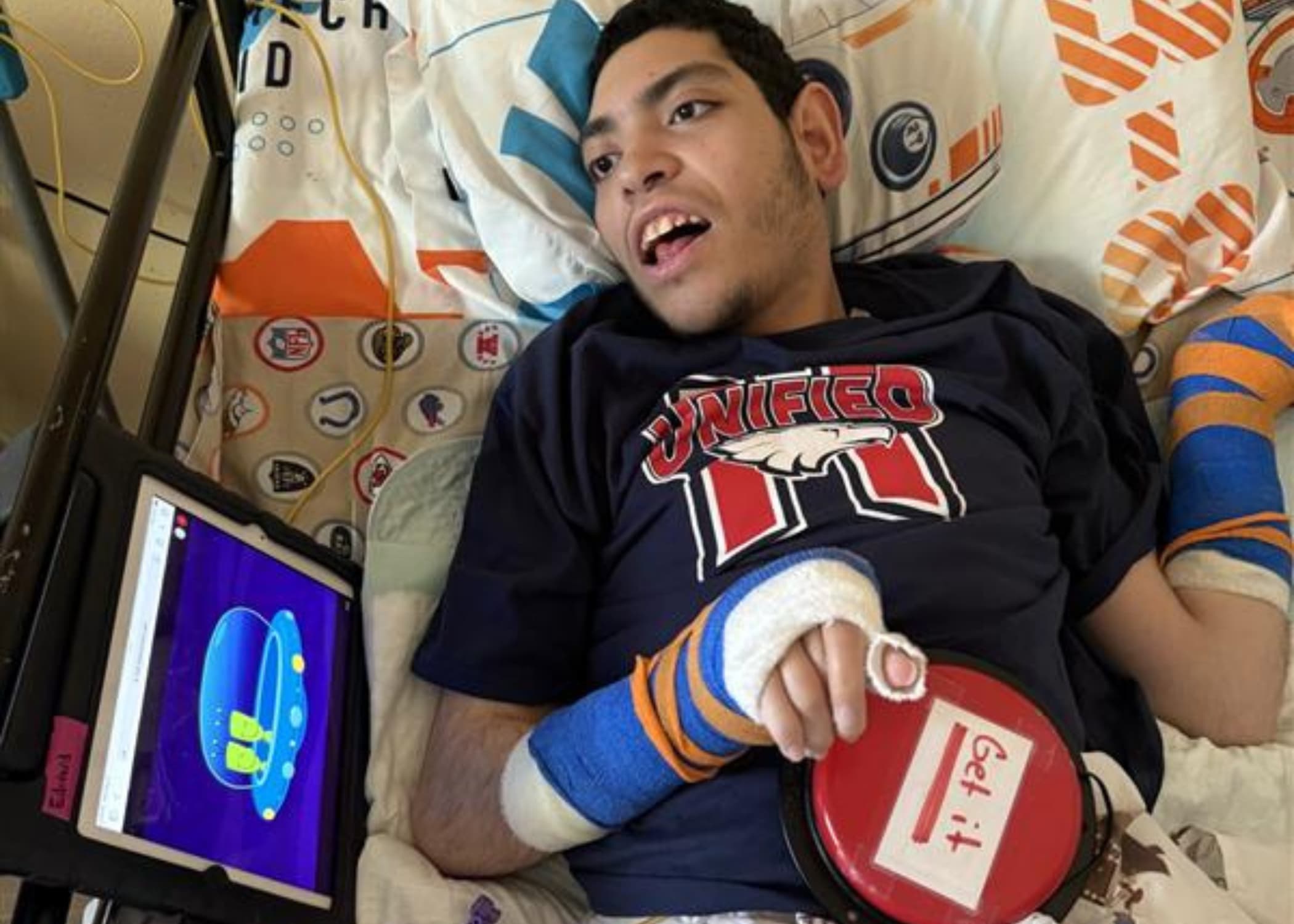 Edward uses his big red switch connected to his ipad